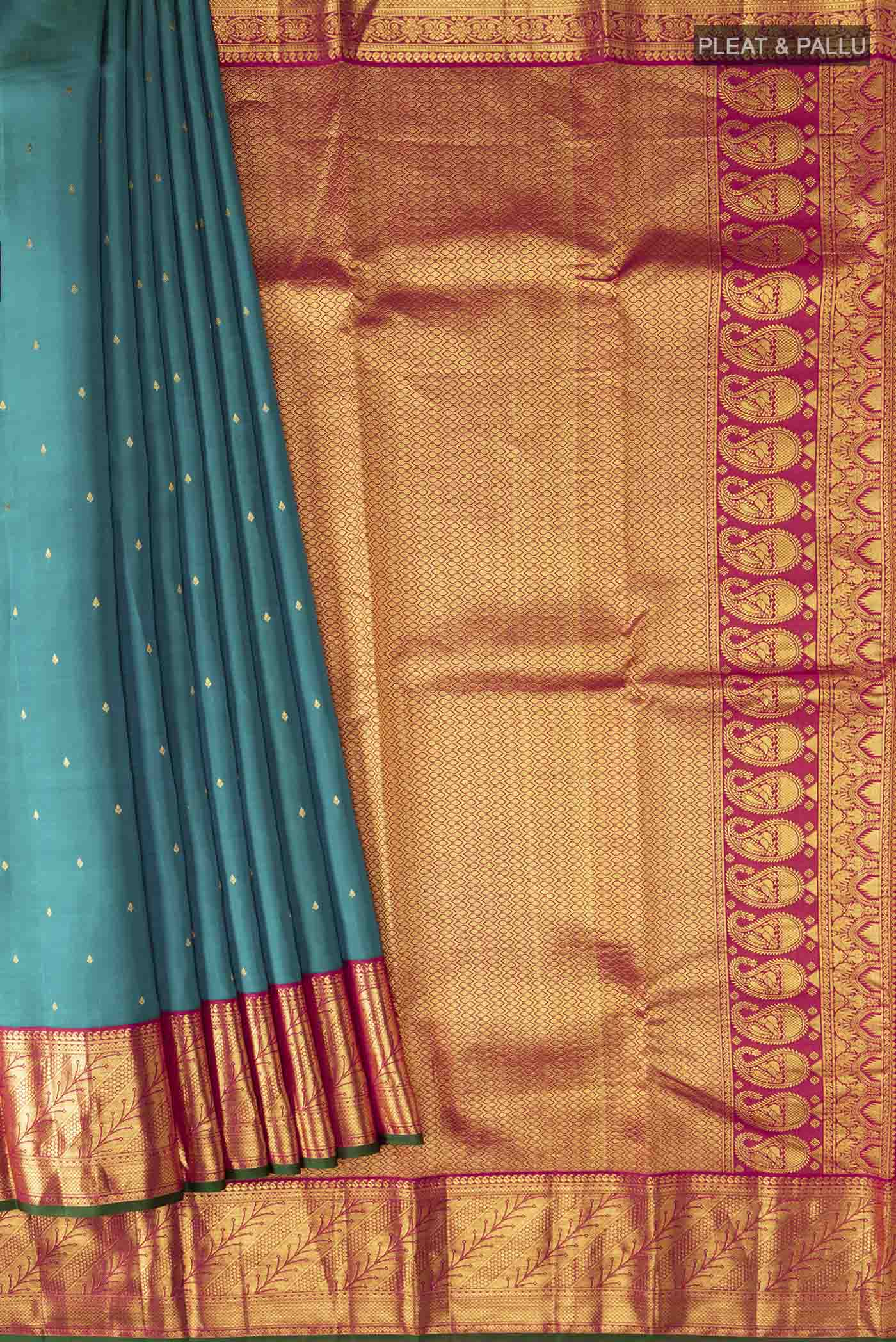 Pleats and pallu of Blue Kanchipuram Silk Saree with Zari Butta on the body and Zari Border