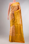 Gold Dual Tone Kanchipuram Tissue Silk Saree with Zari Brocade on the body and Zari Border displayed on a mannequin