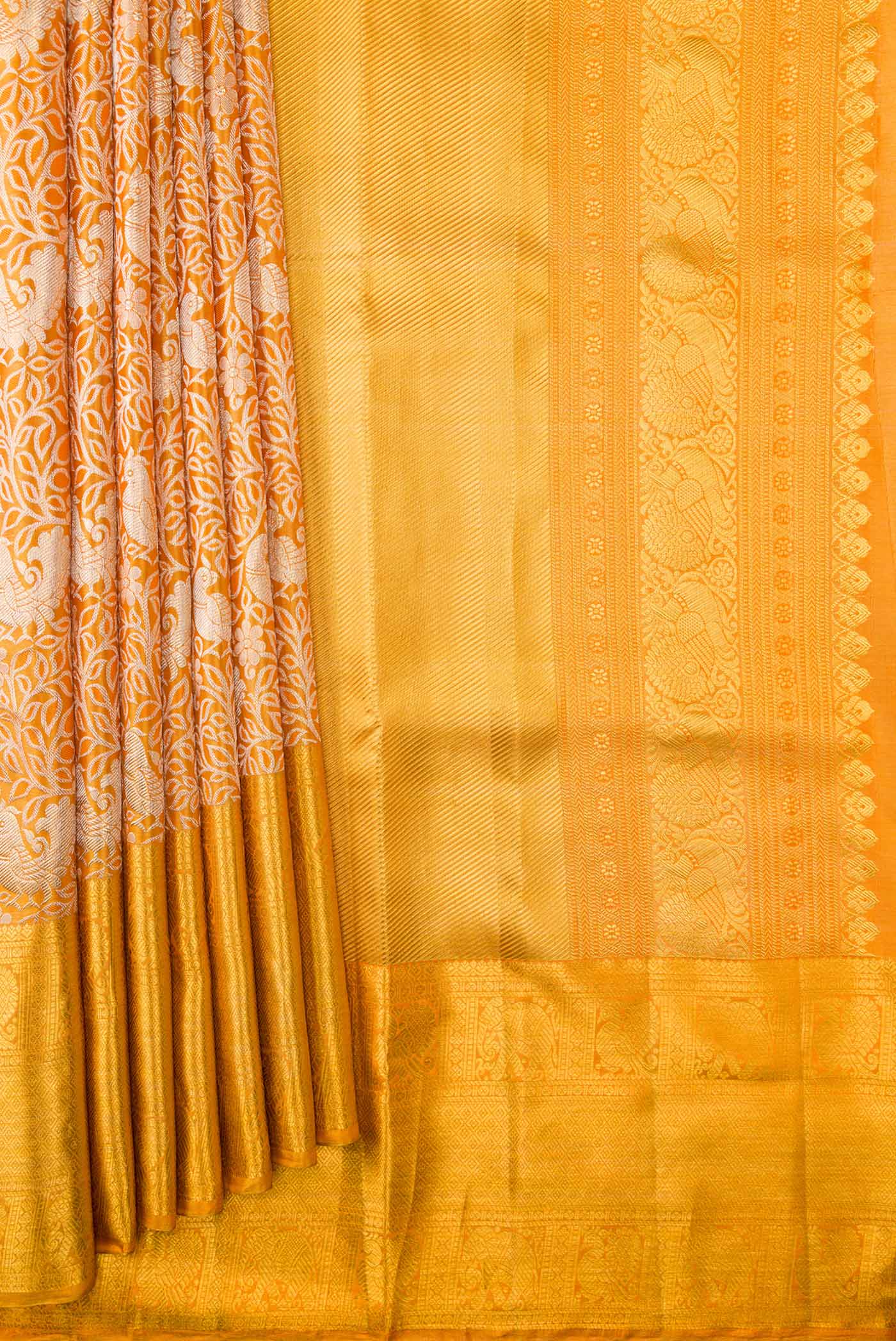 Pleats and pallu of Gold Dual Tone Kanchipuram Tissue Silk Saree with Zari Brocade on the body and Zari Border