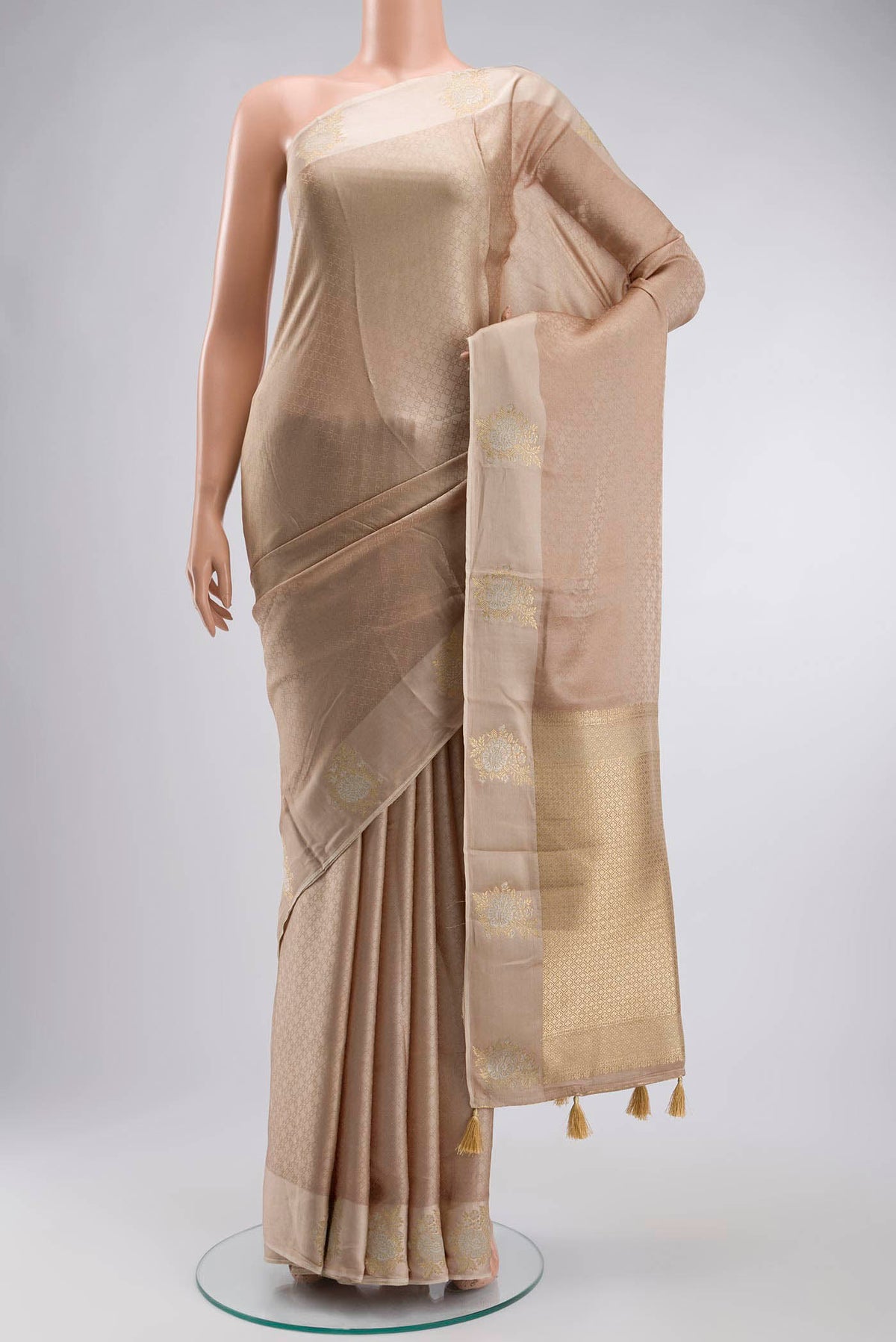 Beige Blended Satin Silk Saree with Jacquard design on the body and Satin Border displayed on a mannequin