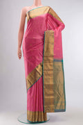 Pink Kanchipuram Silk Saree with Zari Butta on the body and Zari Border displayed on a mannequin
