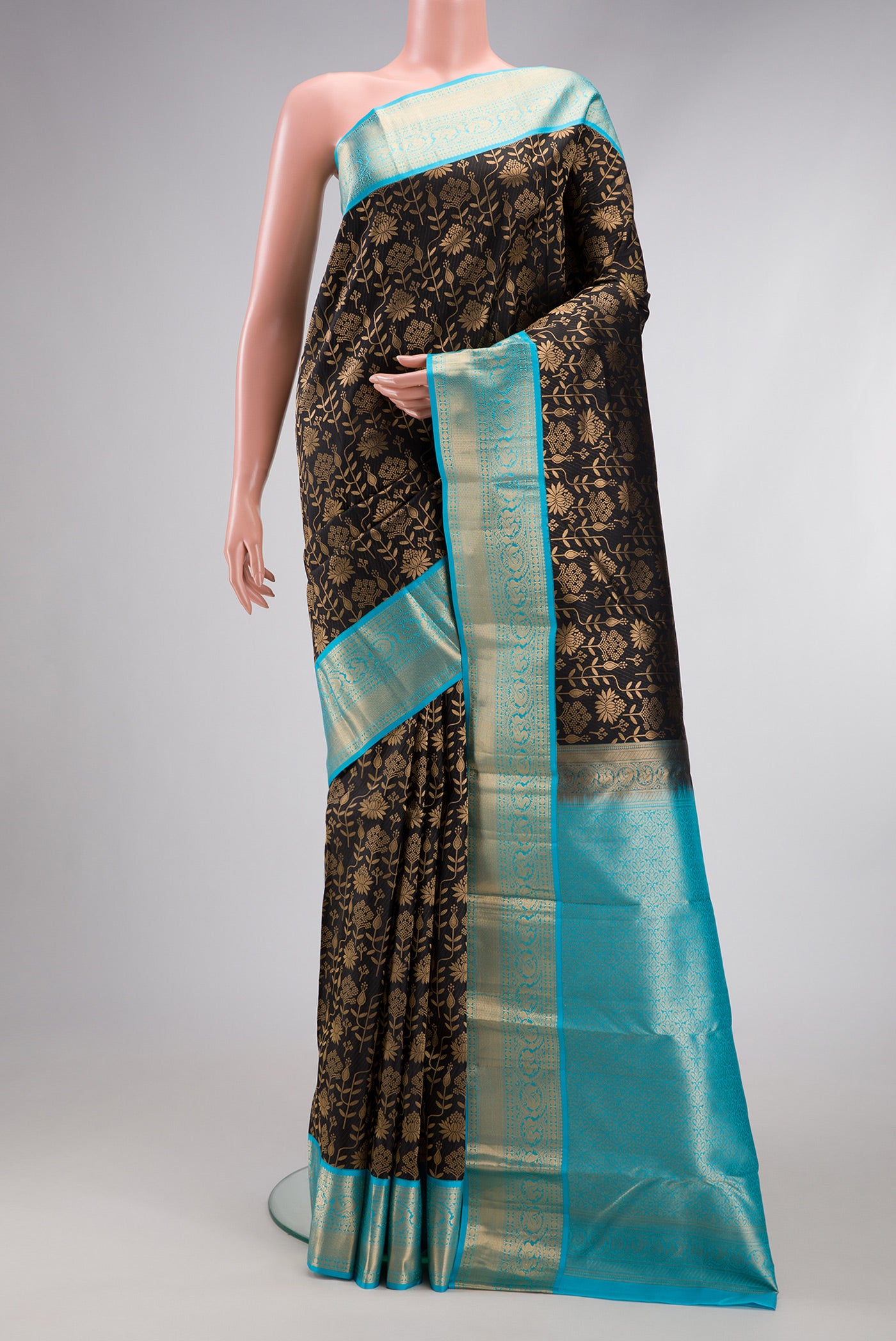 Violet Dual Tone Kanchipuram Silk Saree with Zari Brocade on the body and Zari Border.  displayed on a mannequin