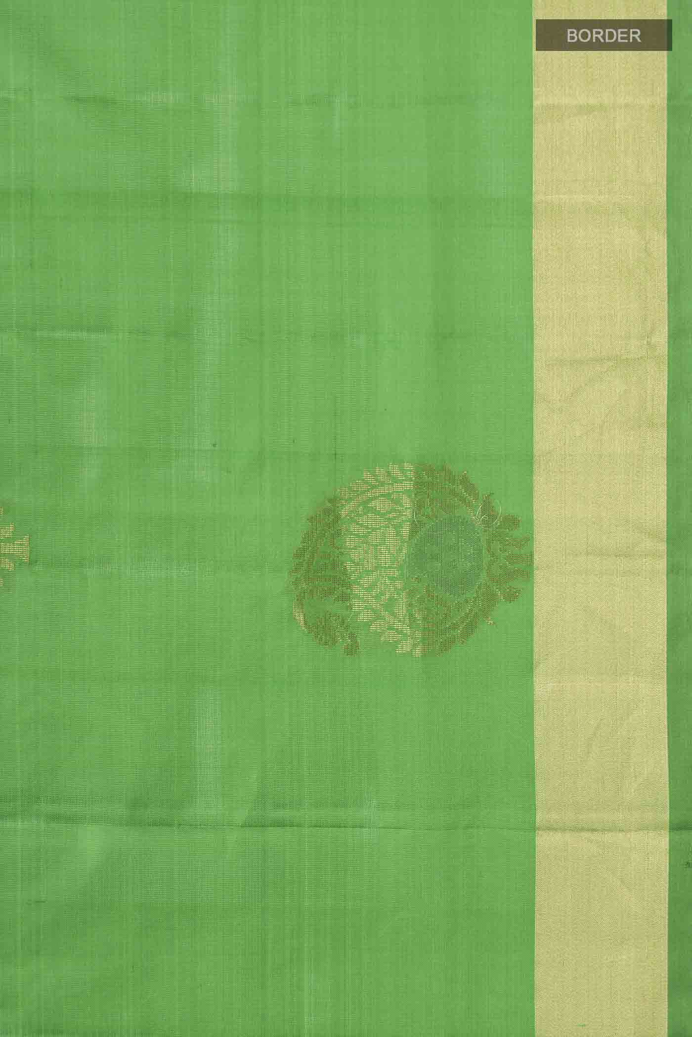 Border image of Green Soft Silk Saree with Zari Butta on the body and Zari Border