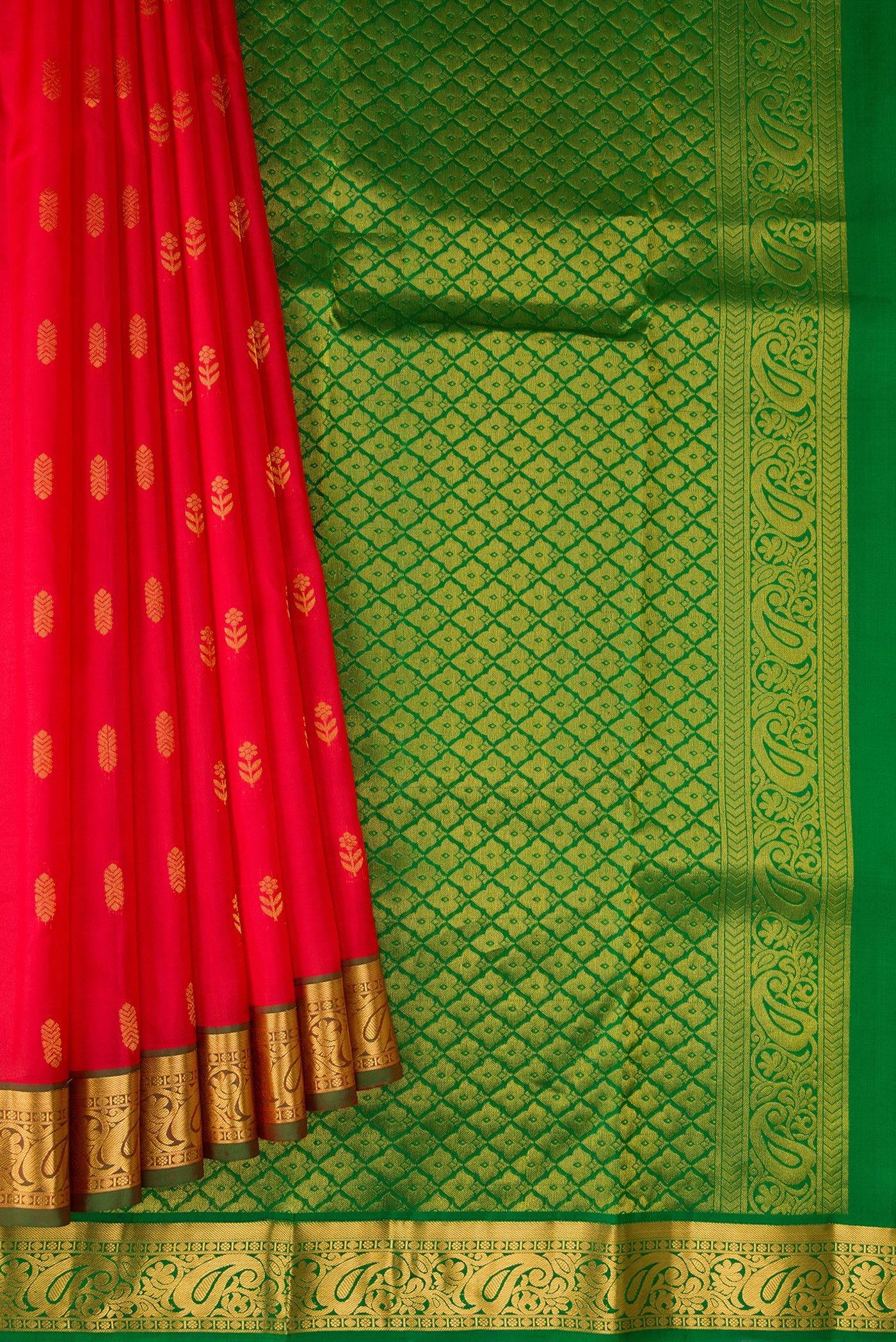 Pleats and pallu of Red Kanchipuram Silk Saree with Zari Butta on the body and Zari Border. 