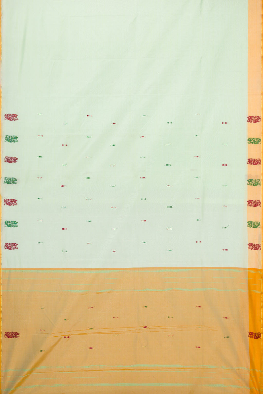 Pista Green Kanchipuram Silk Saree with Thread Butta on the body and Fancy Border.  displayed on a mannequin
