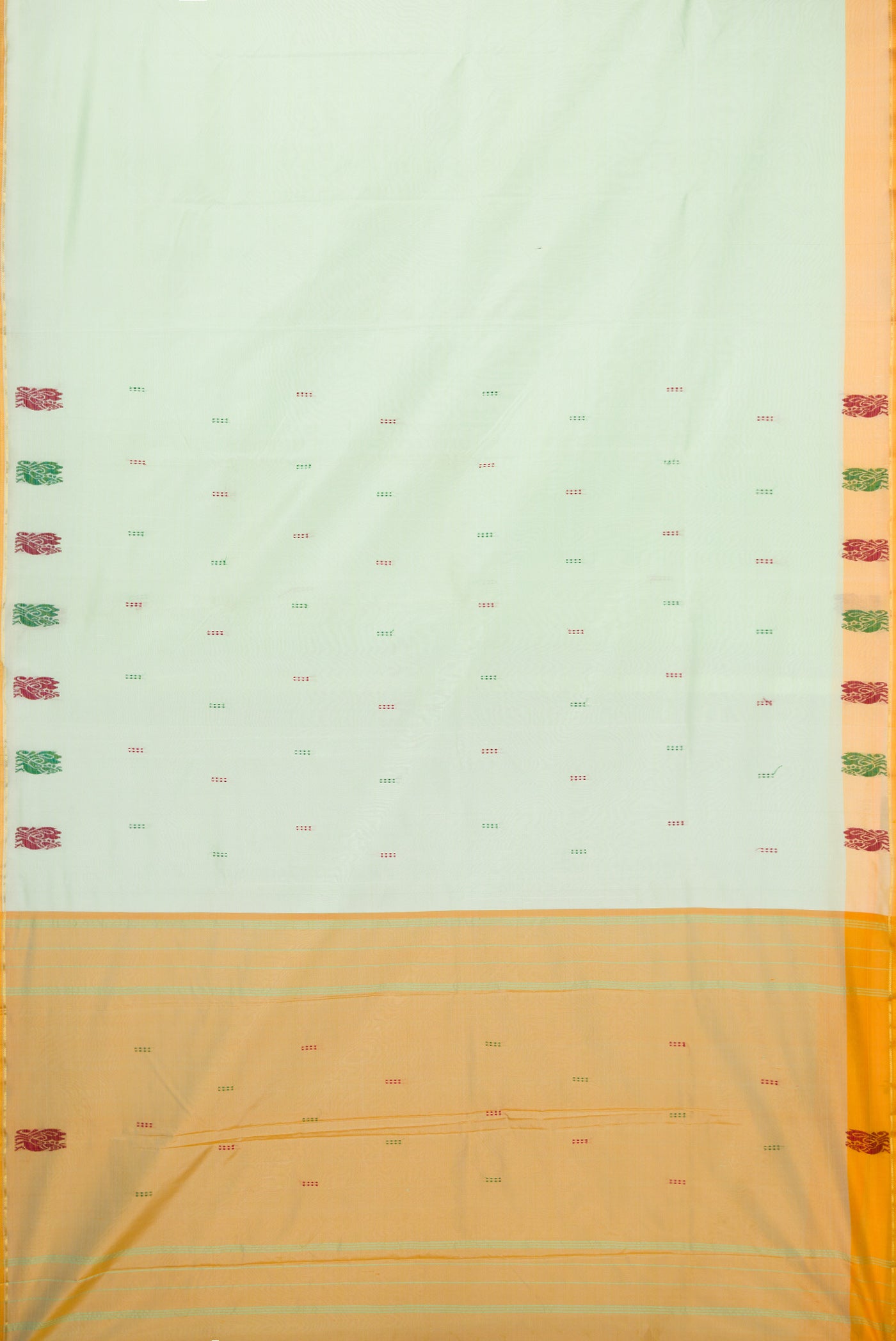 Pista Green Kanchipuram Silk Saree with Thread Butta on the body and Fancy Border.  displayed on a mannequin