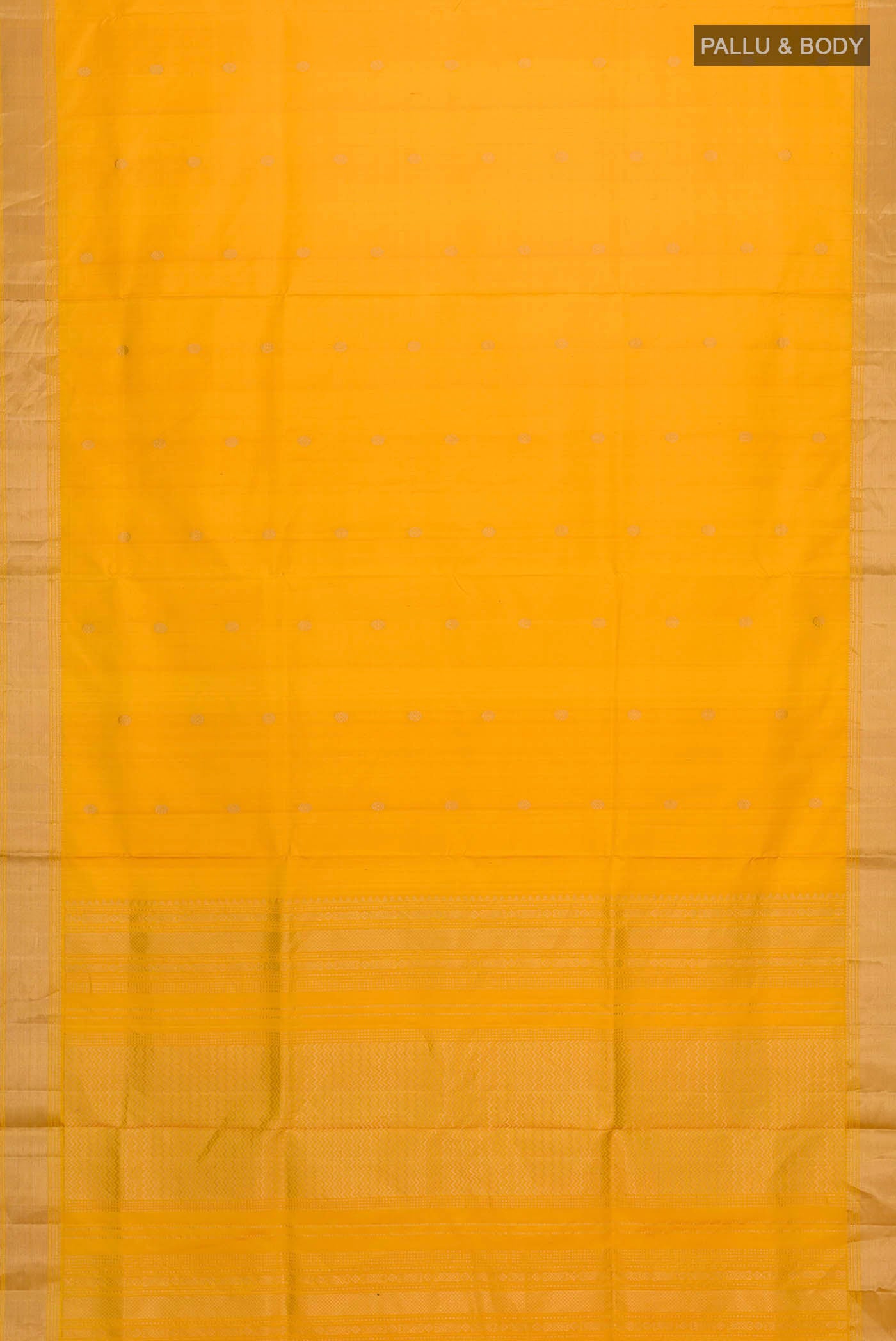Flat view of Yellow Soft Silk Saree with Zari Butta on the body and Zari Border