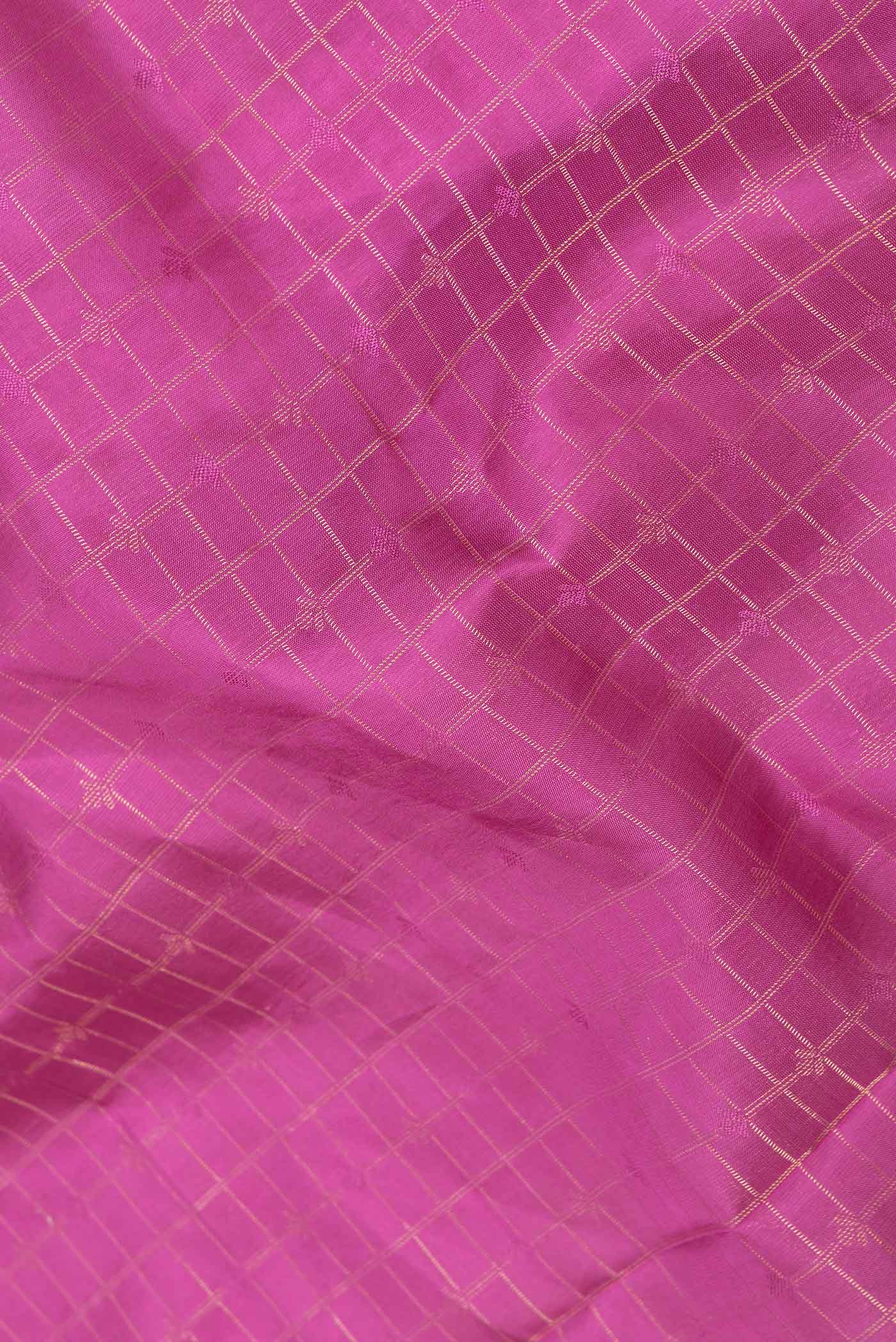 Close up of Pink Dual Tone Soft Silk Saree with Zari Brocade on the body and Zari Border displaying folds