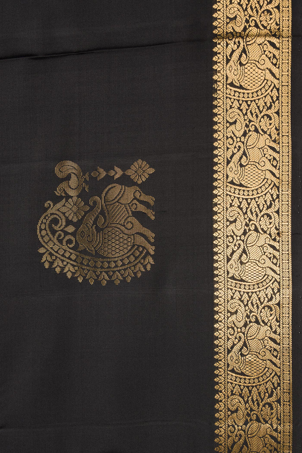 Border image of Black Dual Tone Soft Silk Saree with Zari Butta on the body and Zari Border. 
