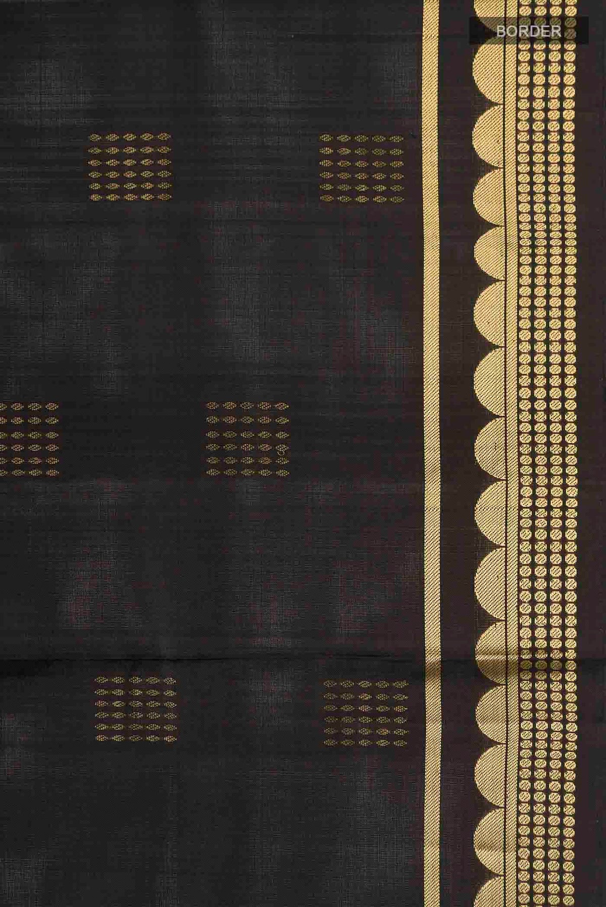 Border image of Black Soft Silk Saree with Zari Butta on the body and Zari Border