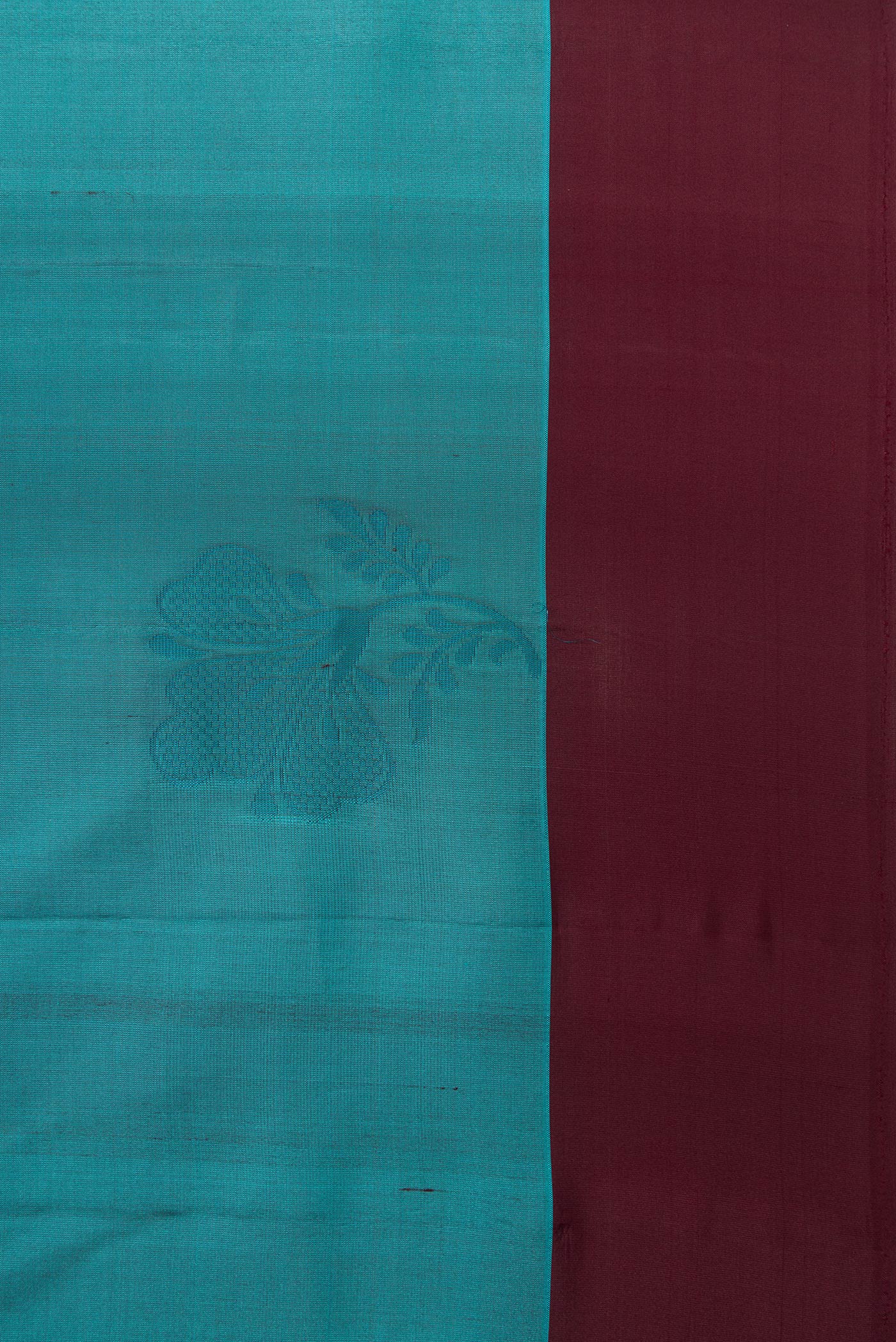 Border image of Peacock Blue Dual Tone Soft Silk Saree with Thread Butta on the body and Plain Border. 