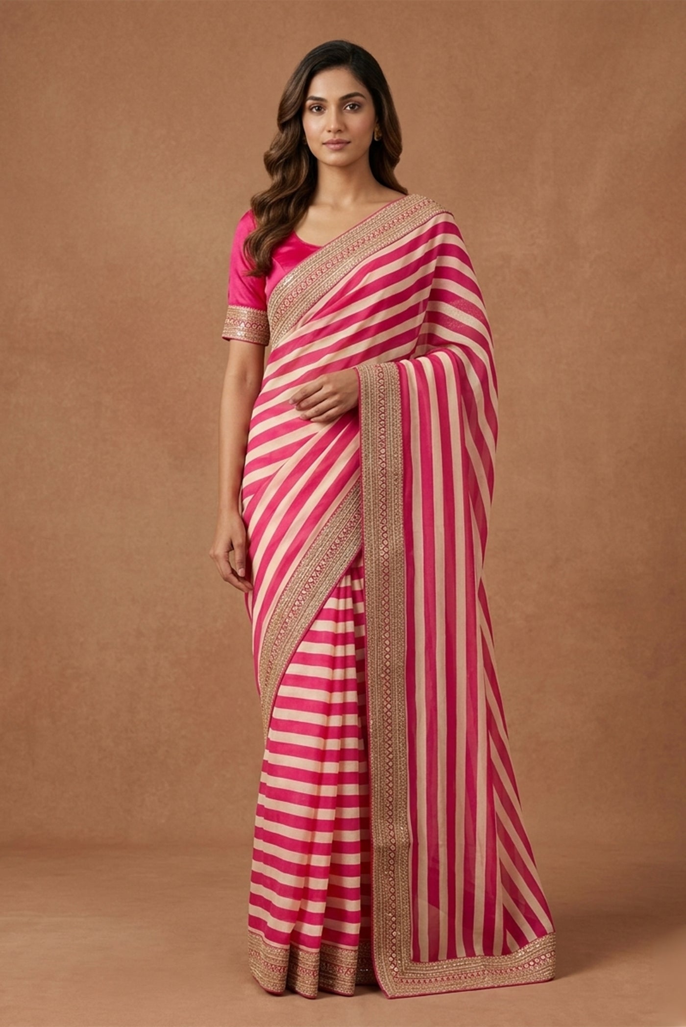 Model wearing a Multi Color Crepe Saree with Stripes on the body and Embroidery Border.