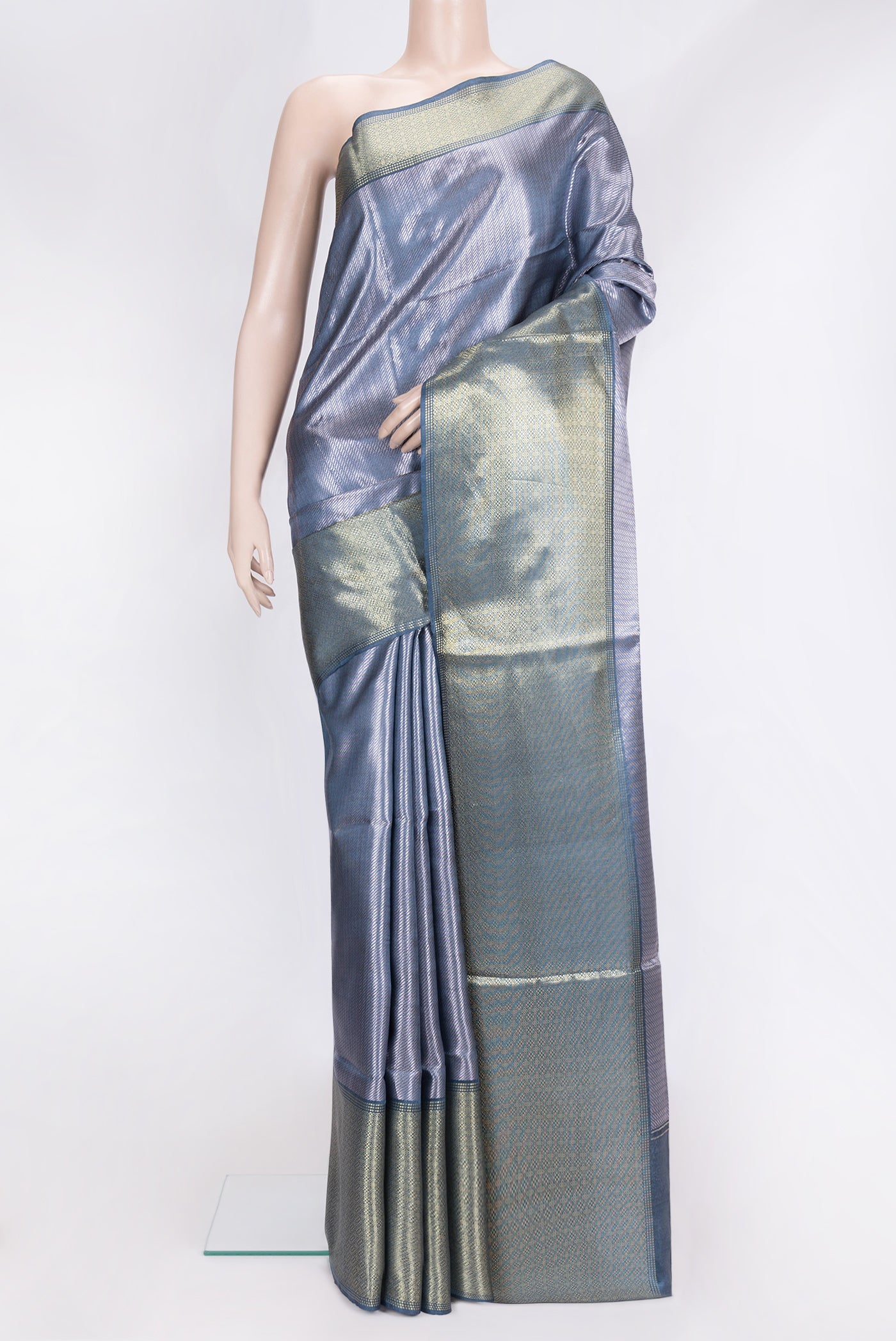 Peacock Blue Dual Tone Tussar Silk Saree with Thread Butta on the body and Zari Border.  displayed on a mannequin