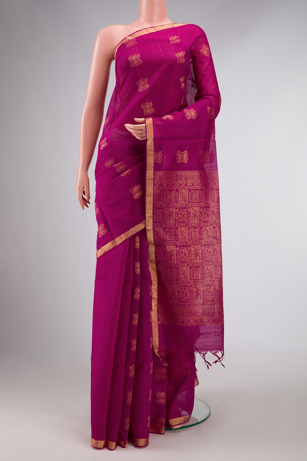 Magenta Dual Tone Silk Cotton Saree with Zari Butta on the body and Zari Border displayed on a mannequin