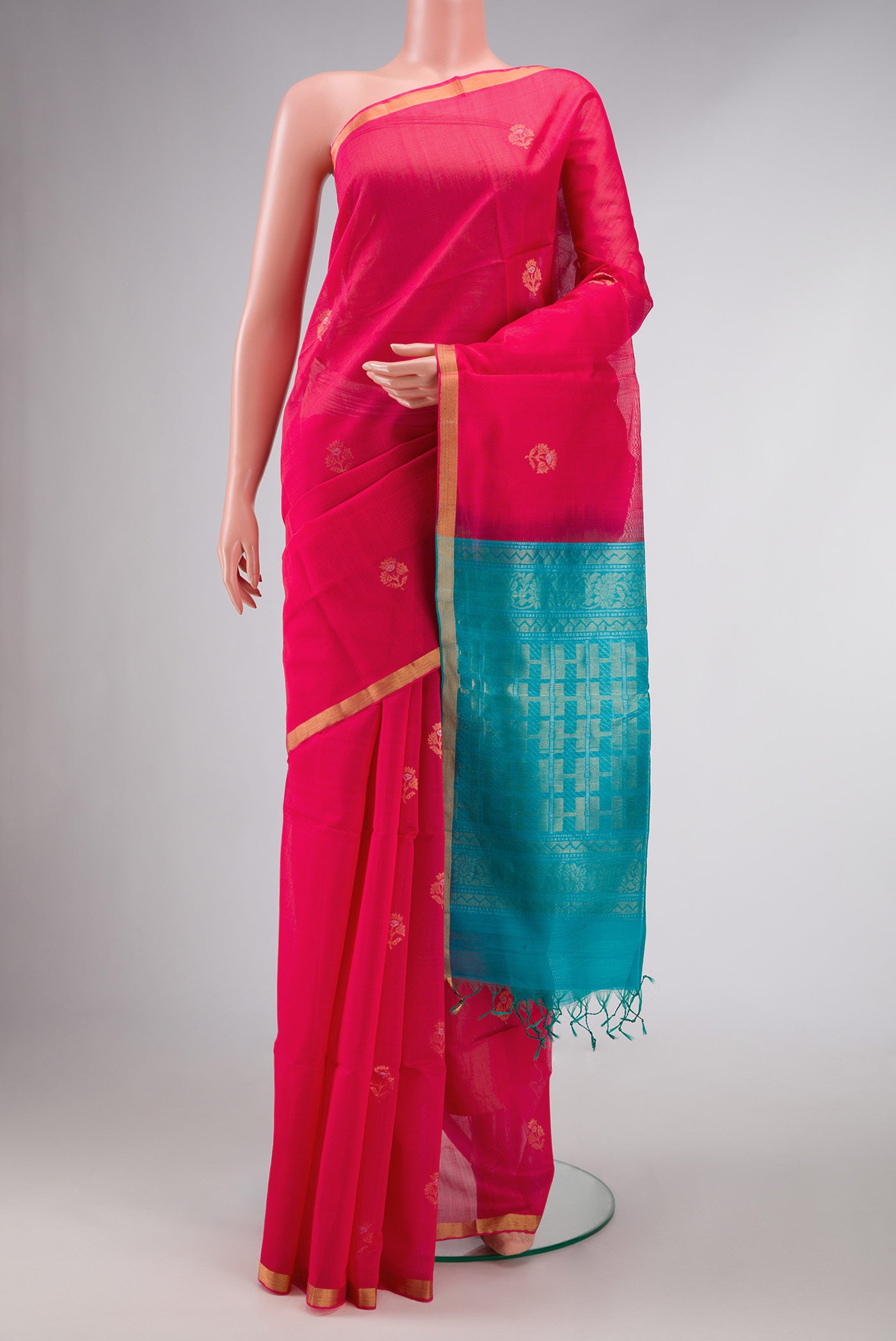 Dark Pink Dual Tone Silk Cotton Saree with Zari Butta on the body and Zari Border displayed on a mannequin
