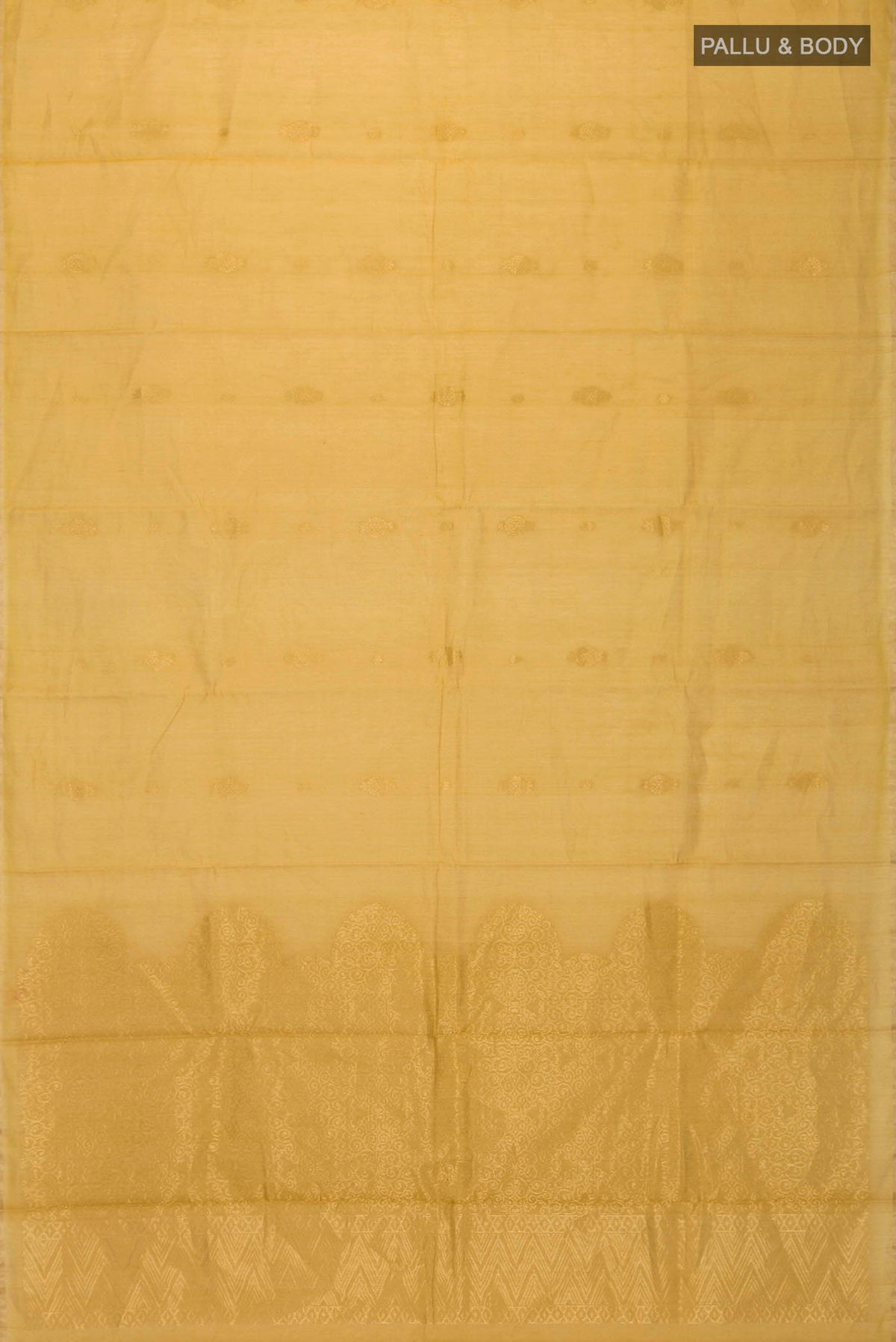 Flat view of Mustard Silk Cotton Saree with Zari Butta on the body and Zari Border