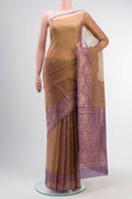 Brown Silk Cotton Saree with Zari Butta on the body and Zari Border displayed on a mannequin