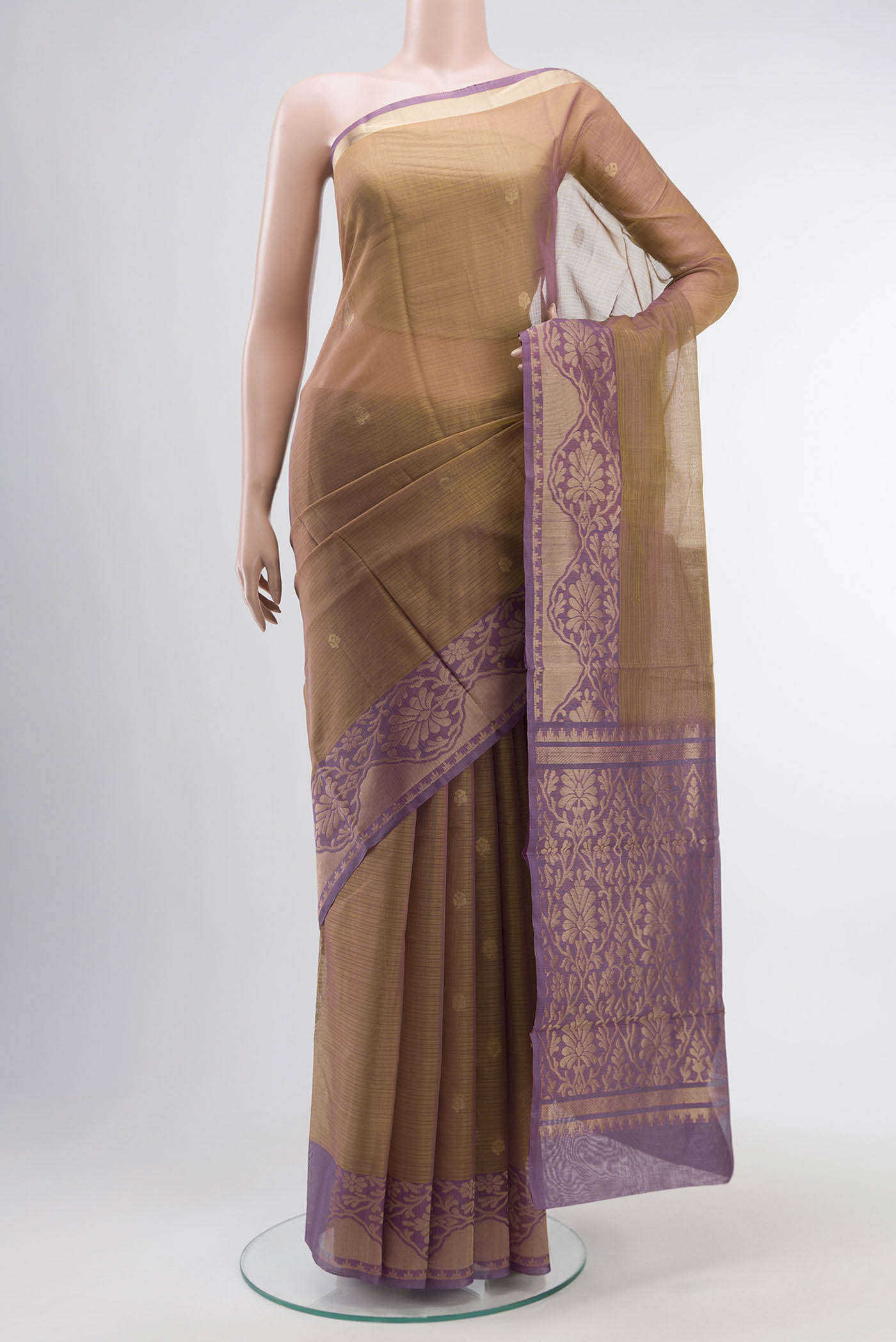 Brown Silk Cotton Saree with Zari Butta on the body and Zari Border displayed on a mannequin