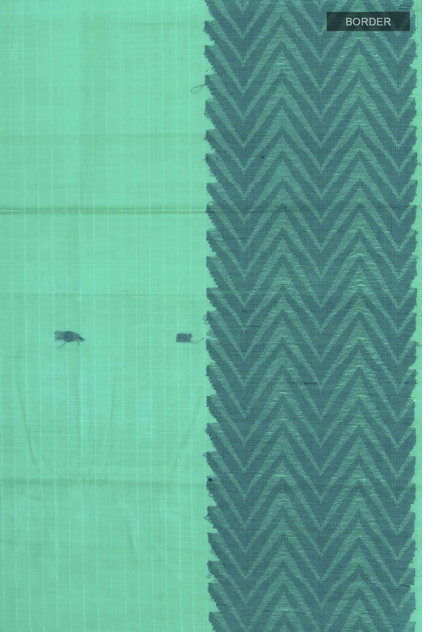 Border image of Green Silk Cotton Saree with Thread Butta on the body and Thread Border