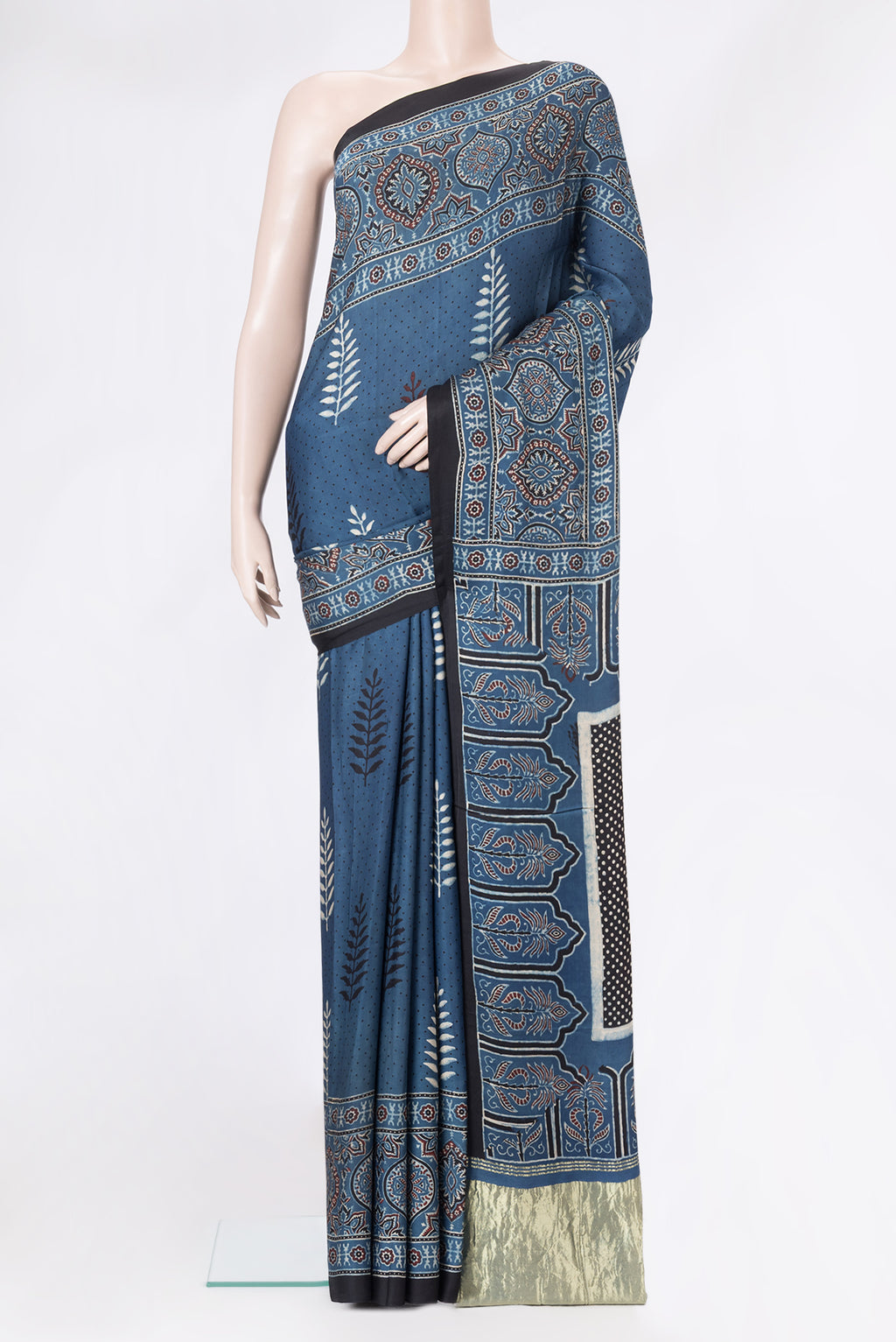 Indigo Dual Tone Blended Crepe Saree with Ajrakh Print on the body and Fancy Border.  displayed on a mannequin