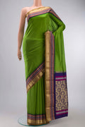 Green Bangalore Silk Saree with Plain Body and Zari And Thread Border displayed on a mannequin