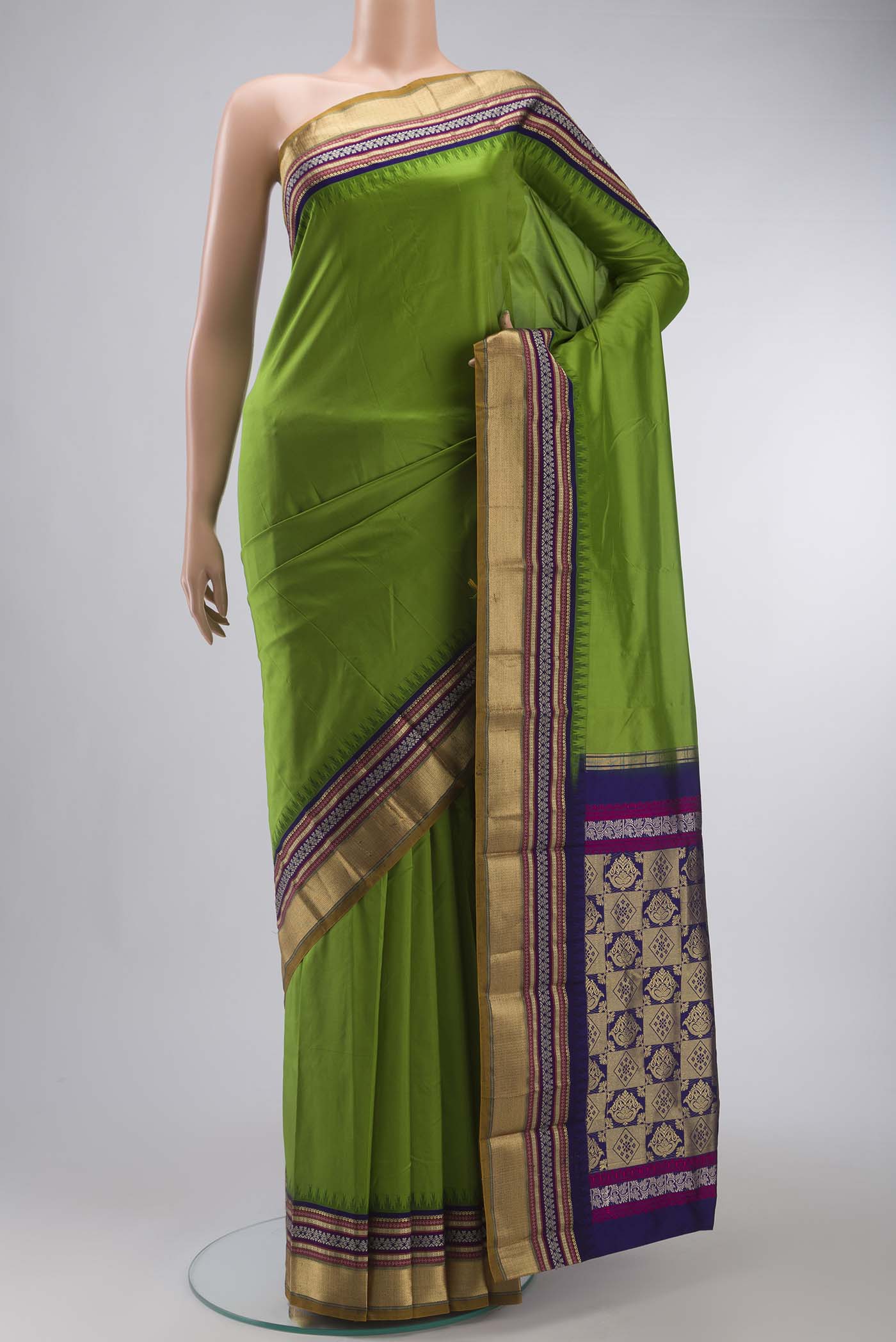 Green Bangalore Silk Saree with Plain Body and Zari And Thread Border displayed on a mannequin