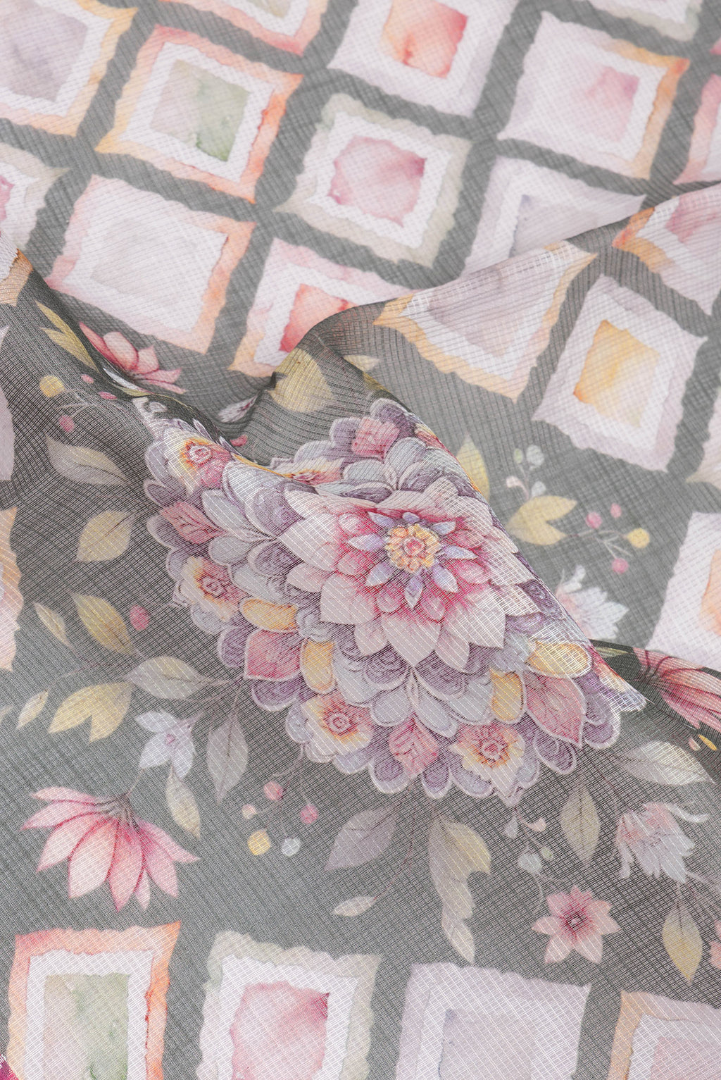 Close up of Multi Color Kota Silk Saree with Printed design on the body and Thread Border.  displaying folds