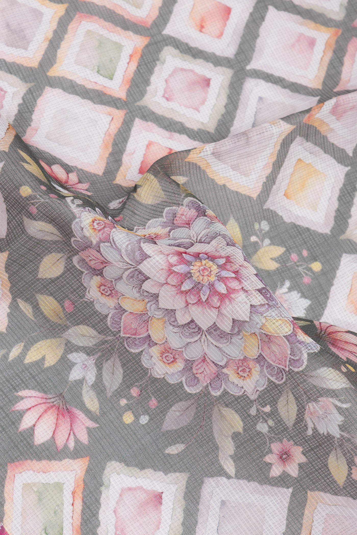 Close up of Multi Color Kota Silk Saree with Printed design on the body and Thread Border.  displaying folds