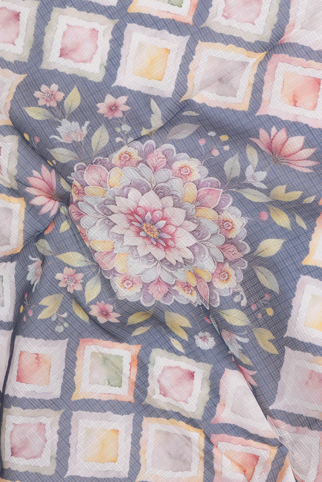 Close up of Beige Kota Silk Saree with Printed design on the body and Thread Border.  displaying folds