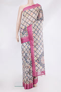 Beige Kota Silk Saree with Printed design on the body and Thread Border.  displayed on a mannequin