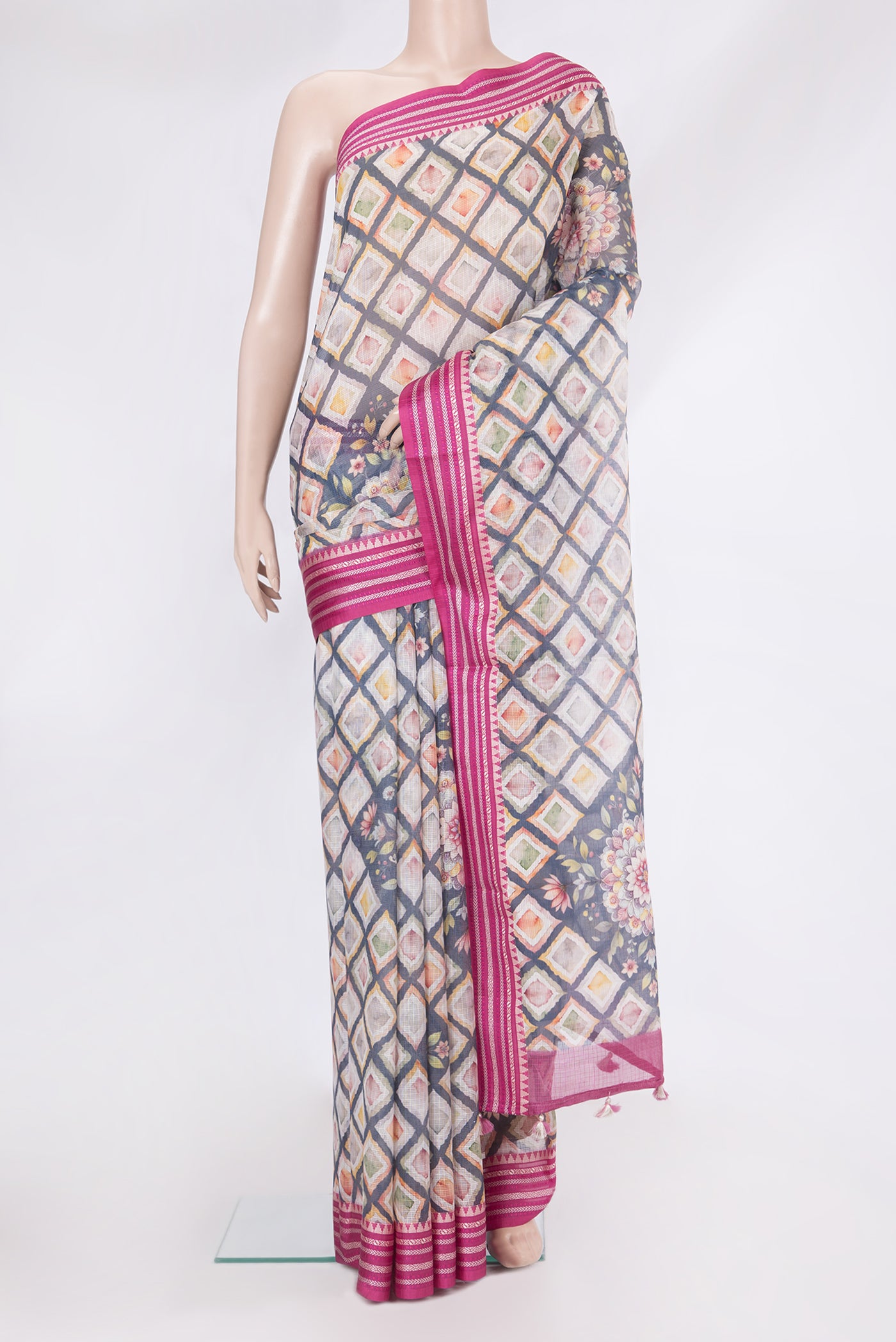 Beige Kota Silk Saree with Printed design on the body and Thread Border.  displayed on a mannequin