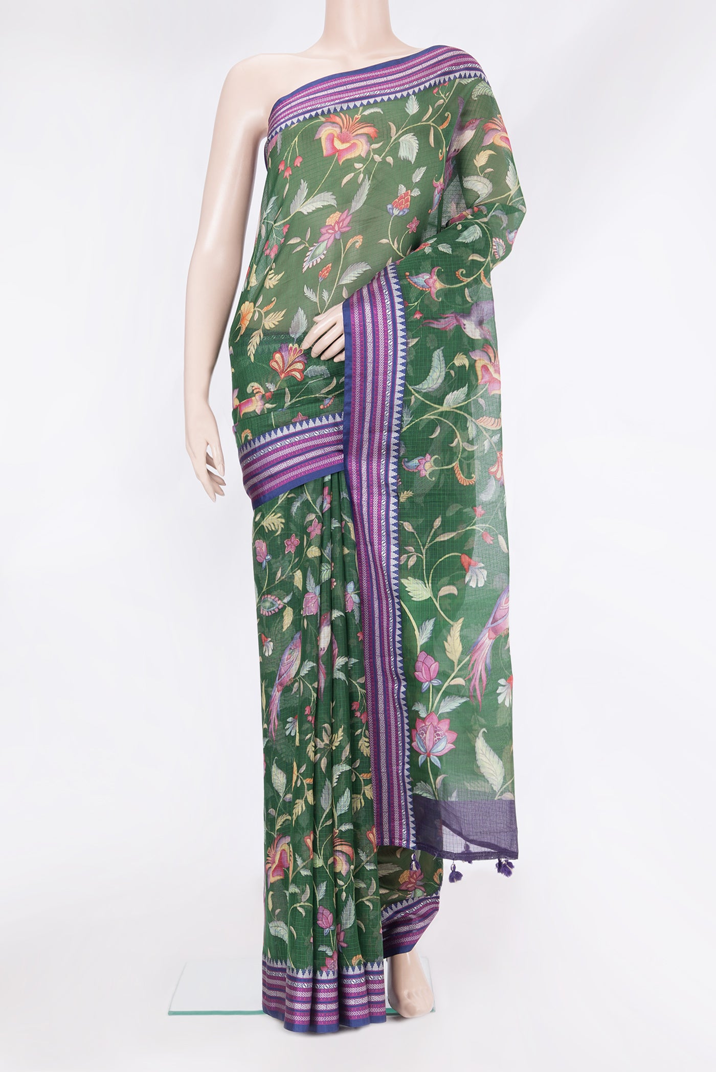 Green Kota Silk Saree with Floral Print on the body and Thread Border.  displayed on a mannequin