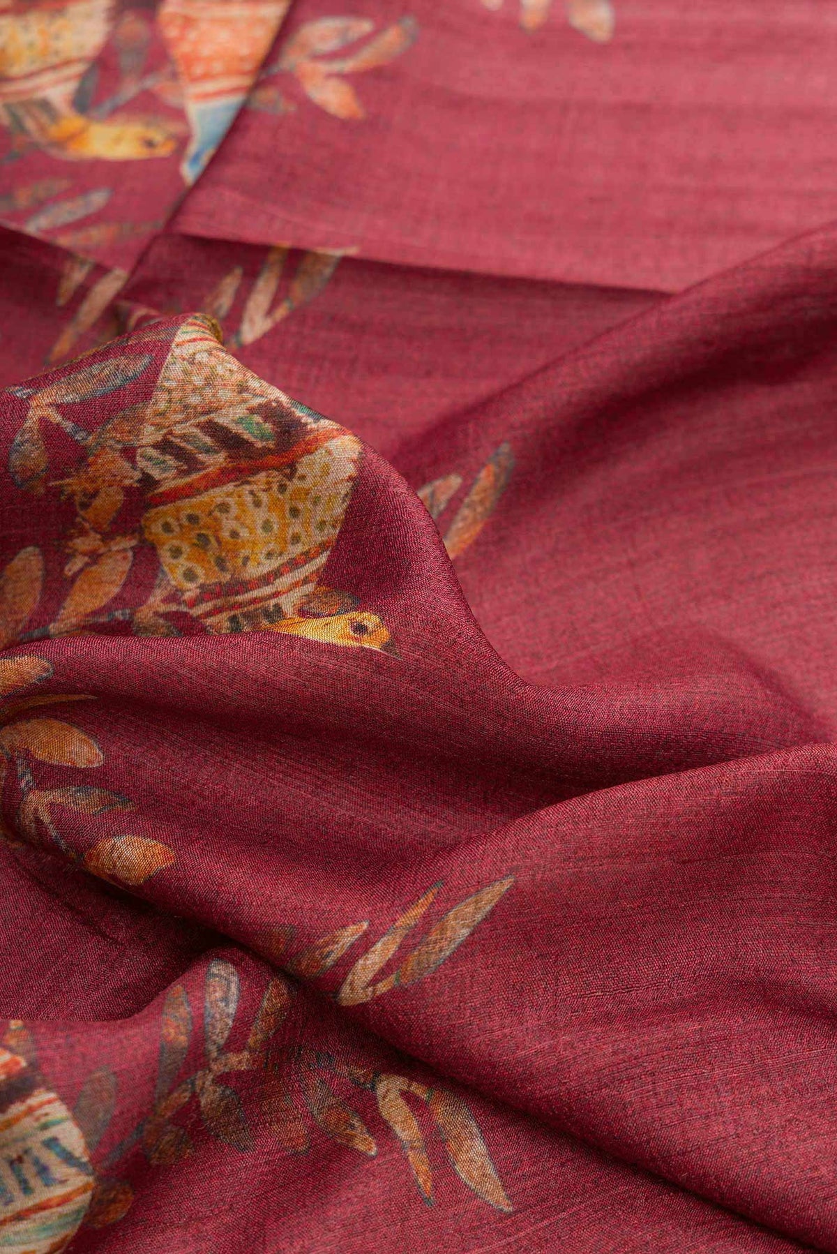 Close up of Mauve Dual Tone Tussar Silk Saree with Plain Body and Fancy Border displaying folds