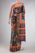 Purple Dual Tone Tussar Silk Saree with Printed design on the body and Fancy Border displayed on a mannequin