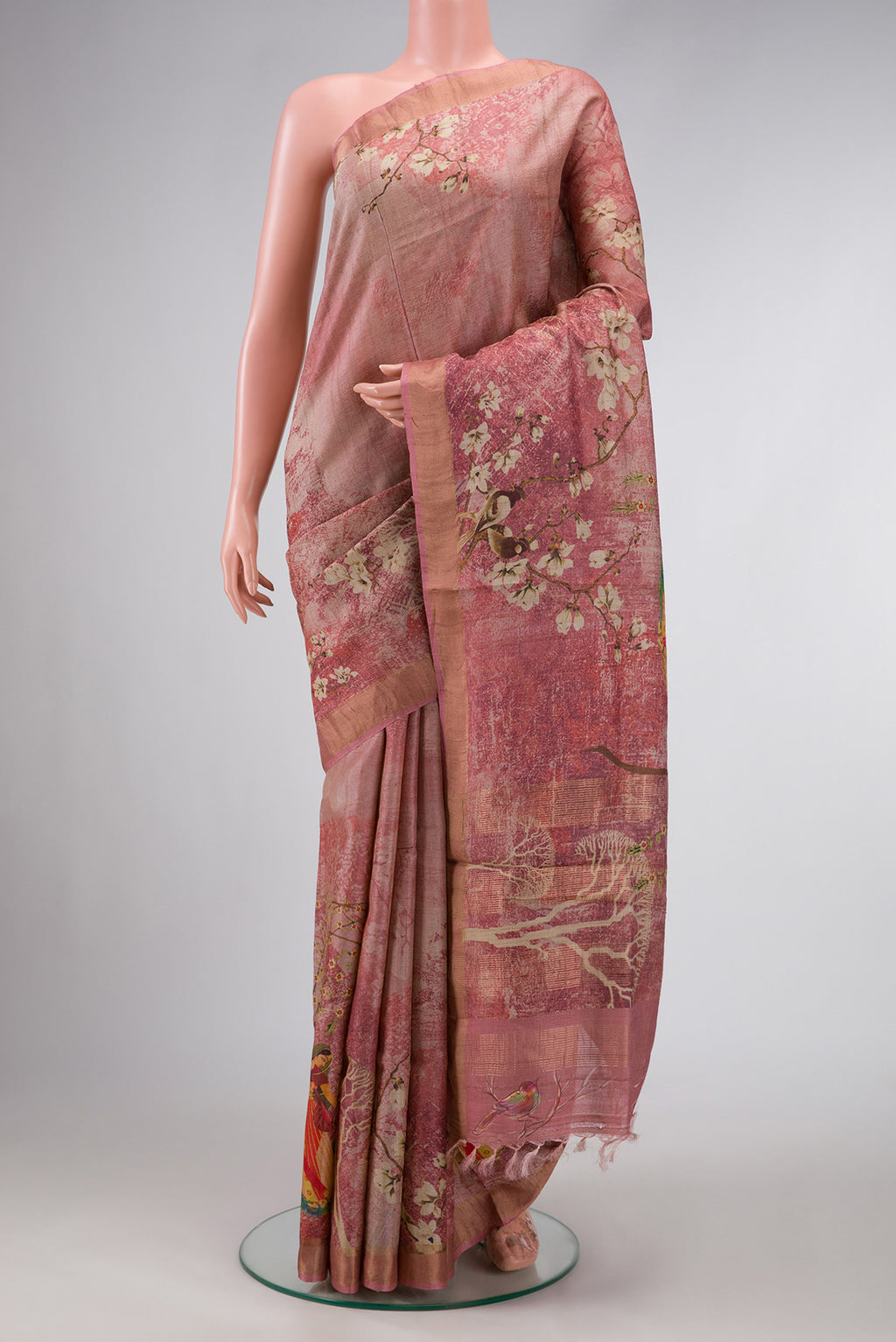 Pink Dual Tone Tussar Silk Saree with Printed design on the body and Zari Border.  displayed on a mannequin