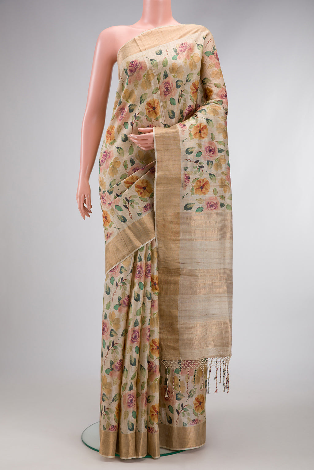 Beige Dual Tone Tussar Silk Saree with Printed design on the body and Zari Border.  displayed on a mannequin