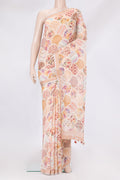 Peach Linen Saree with Printed design on the body and Zari Border.  displayed on a mannequin