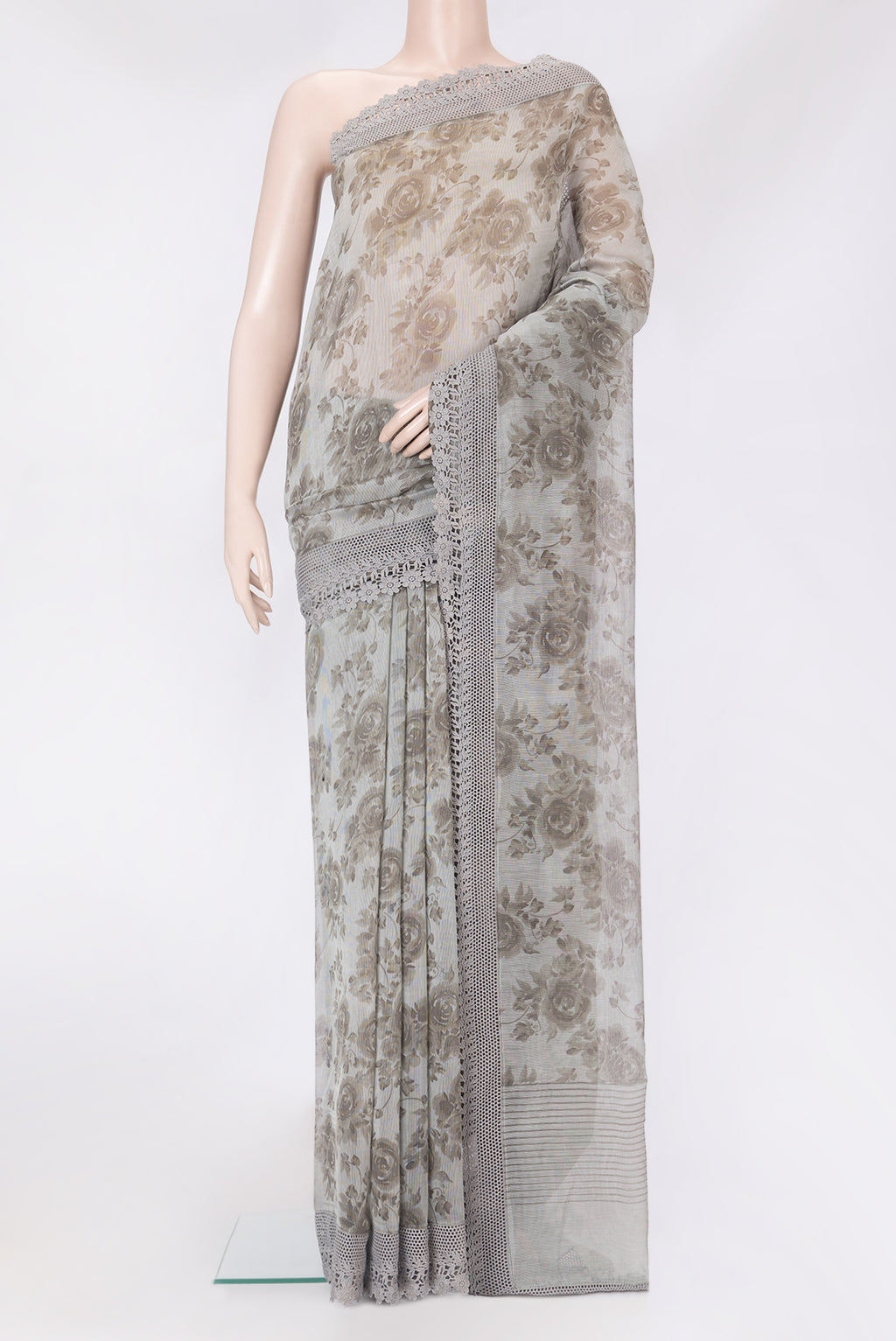 Grey Blended Kota Silk Saree with Printed design on the body and Embroidery Border.  displayed on a mannequin