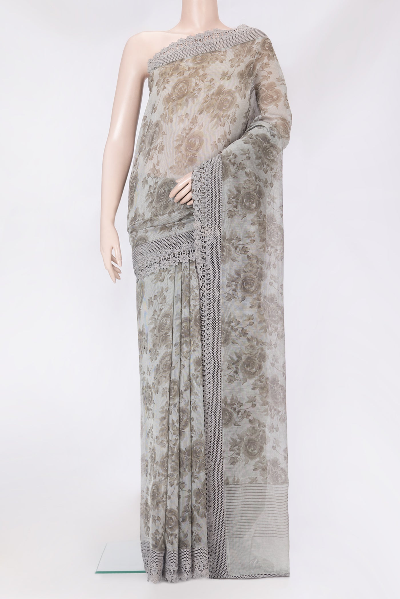 Grey Blended Kota Silk Saree with Printed design on the body and Embroidery Border.  displayed on a mannequin