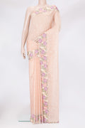 Peach Kota Silk Saree with Zari Butta on the body and Embroidery Border.  displayed on a mannequin