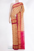 Sandal Silk Cotton Saree with Ikat Print on the body and Zari Border.  displayed on a mannequin