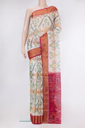 Off White Silk Cotton Saree with Ikat Print on the body and Zari Border.  displayed on a mannequin