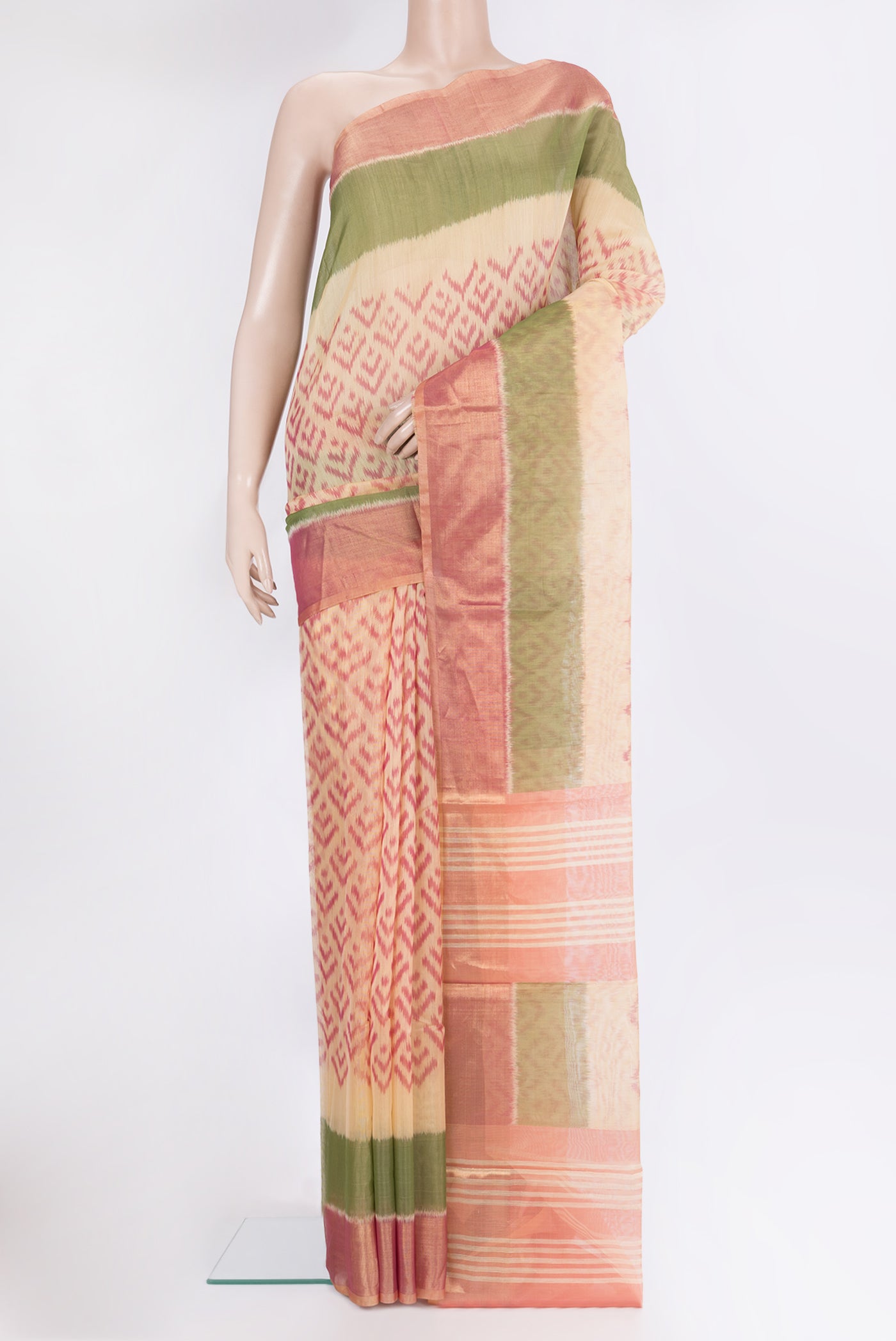Sandal Silk Cotton Saree with Ikat Print on the body and Zari Border.  displayed on a mannequin