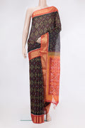 Black Silk Cotton Saree with Ikat Print on the body and Zari Border.  displayed on a mannequin