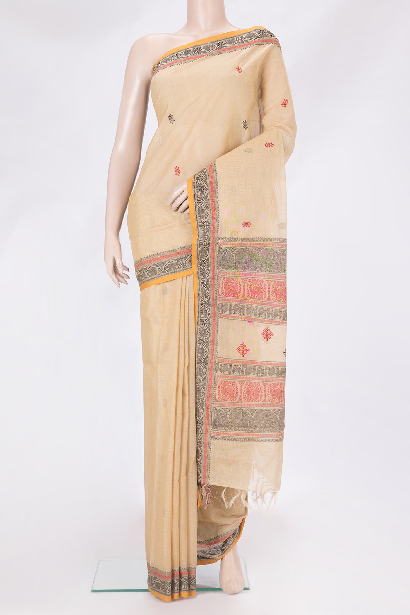 Beige Kanchi Cotton Saree with Thread Butta on the body and Thread Border.  displayed on a mannequin