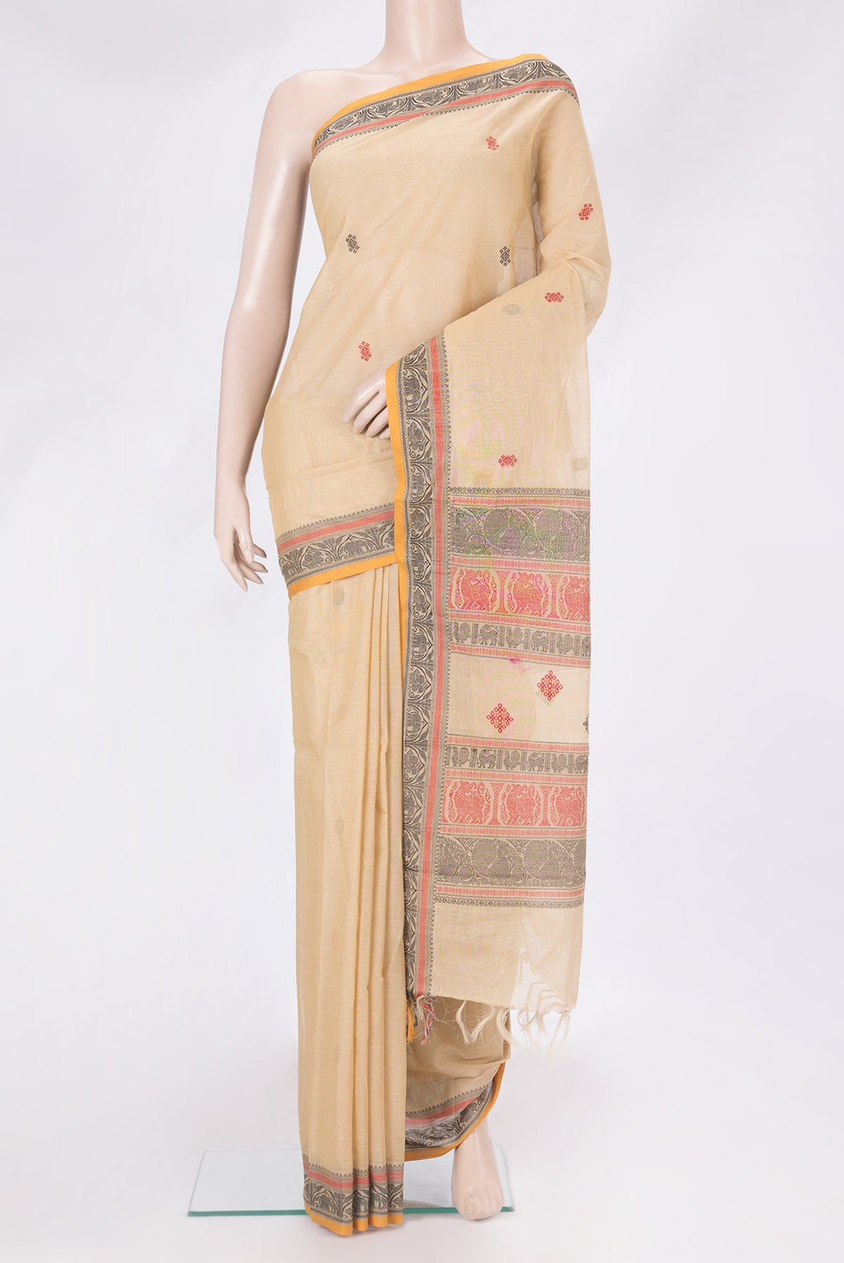 Beige Kanchi Cotton Saree with Thread Butta on the body and Thread Border.  displayed on a mannequin