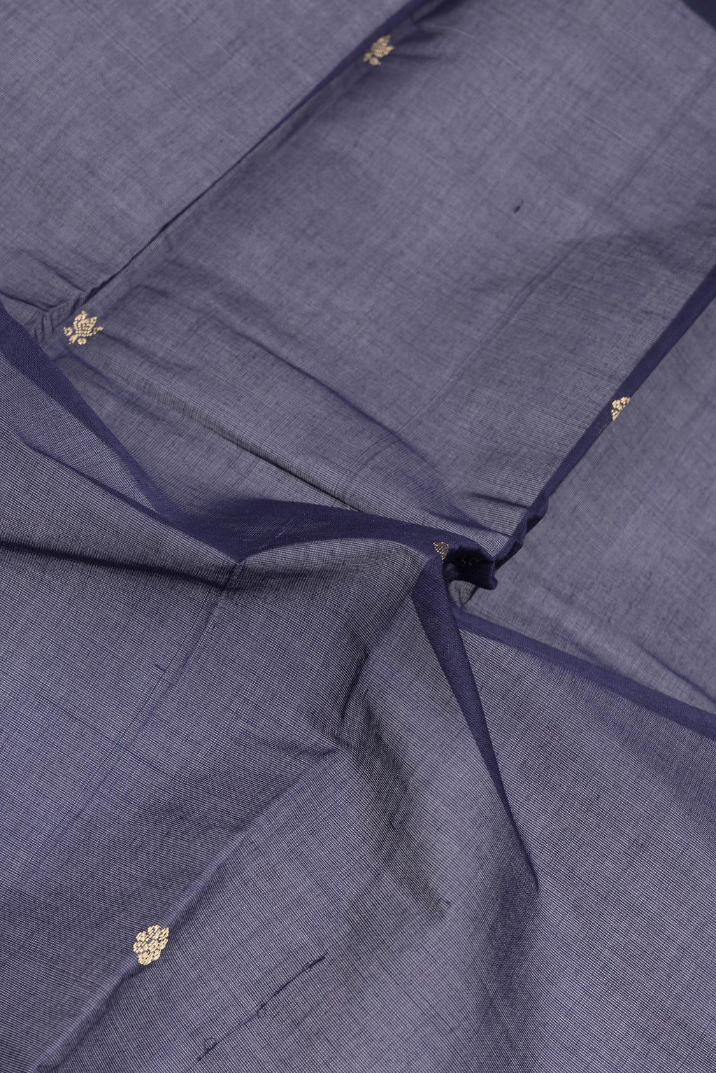 Close up of Navy Blue Kanchi Cotton Saree with Thread Butta on the body and Plain Border.  displaying folds
