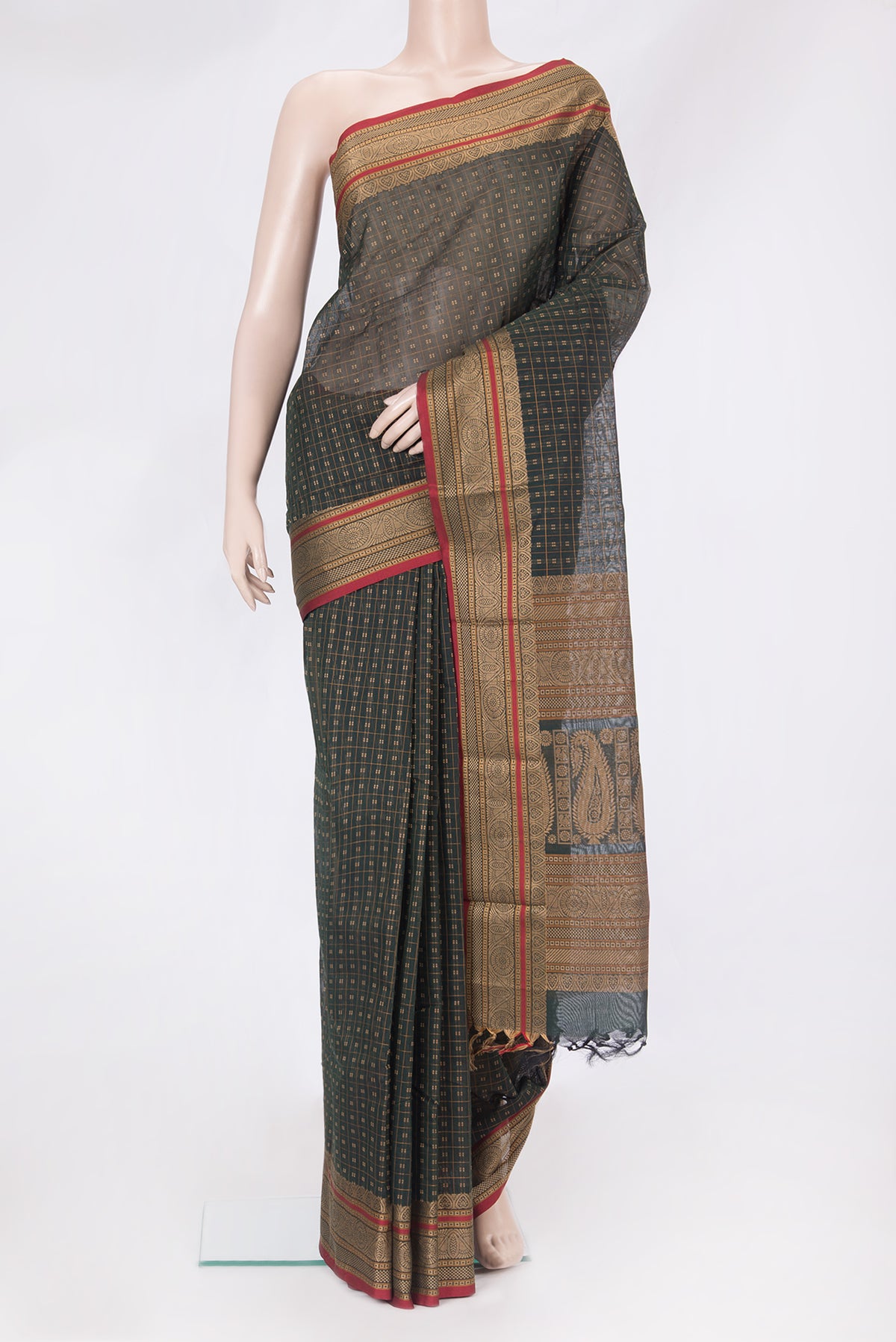 Bottle Green Kanchi Cotton Saree with Checked design on the body and Thread Border.  displayed on a mannequin