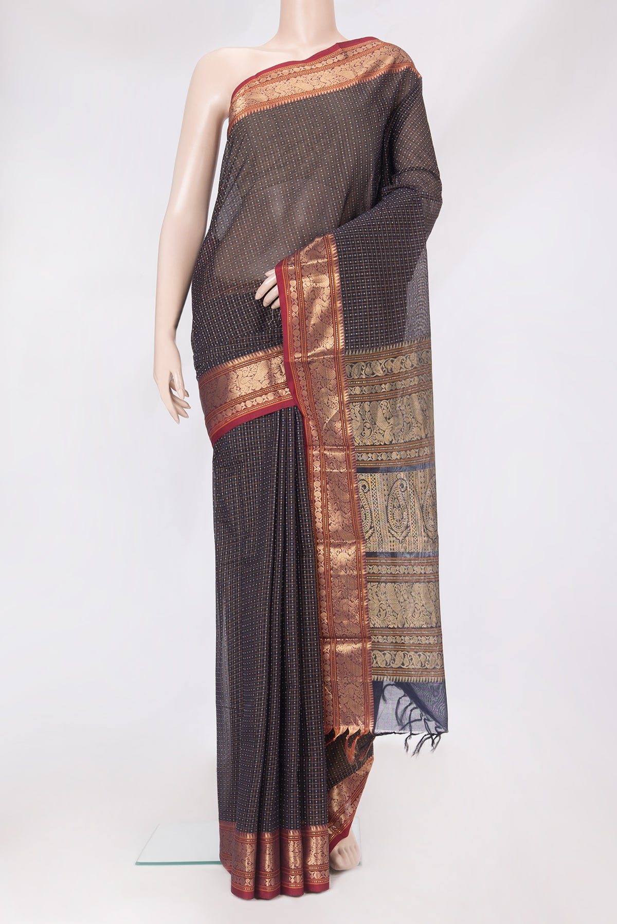 Navy Blue Kanchi Cotton Saree with Checked design on the body and Zari Border.  displayed on a mannequin
