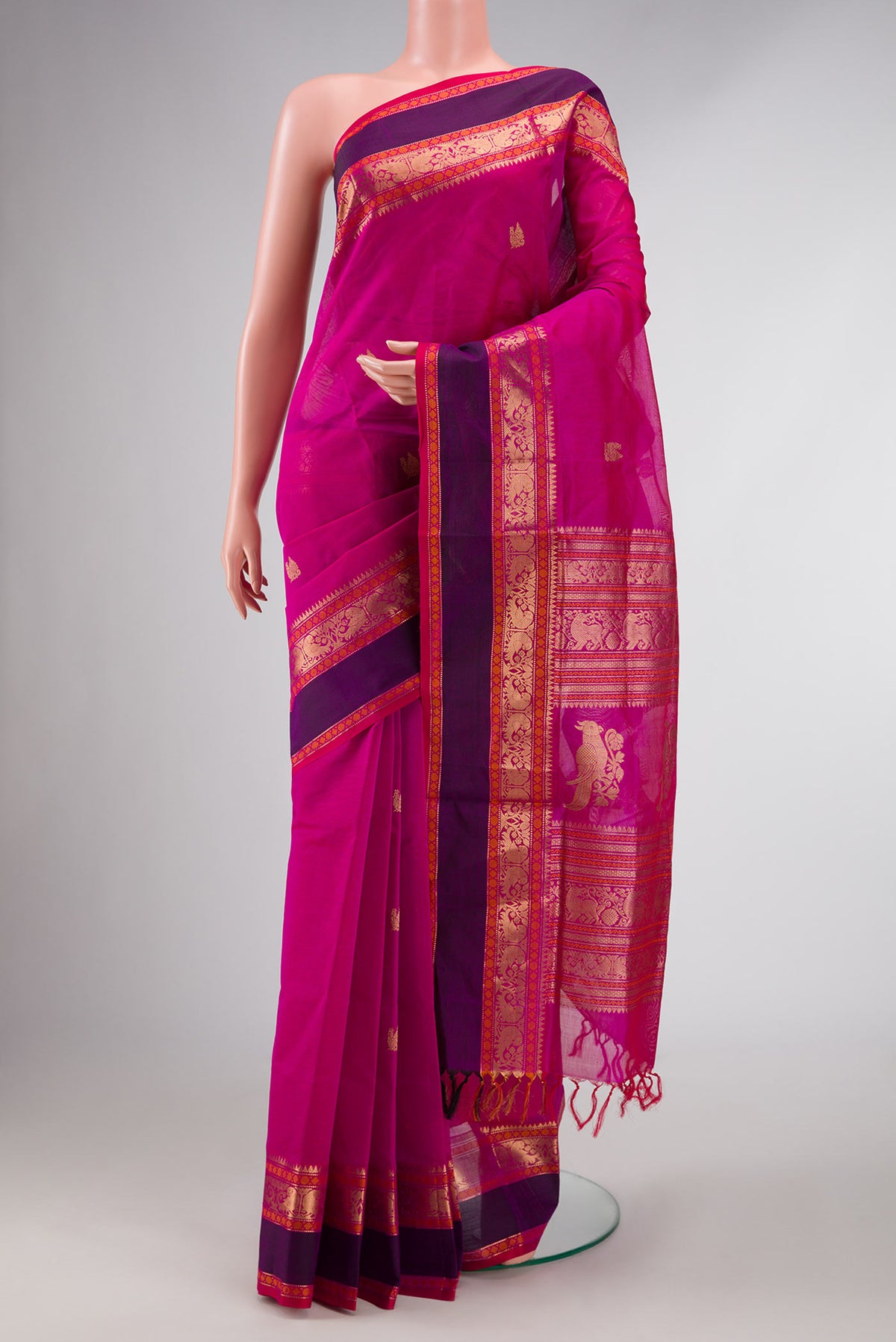 Pink Dual Tone Silk Cotton Saree with Zari Butta on the body and Zari Border displayed on a mannequin